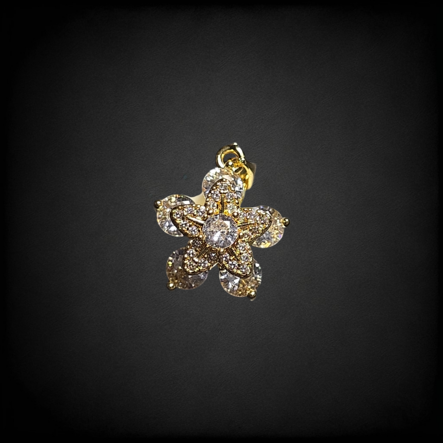 Dije Flor Giratoria Oro Laminado con Zirconias